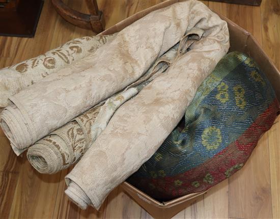 Three rolls of upholstery woven fabrics and various sample pieces and woolwork panels